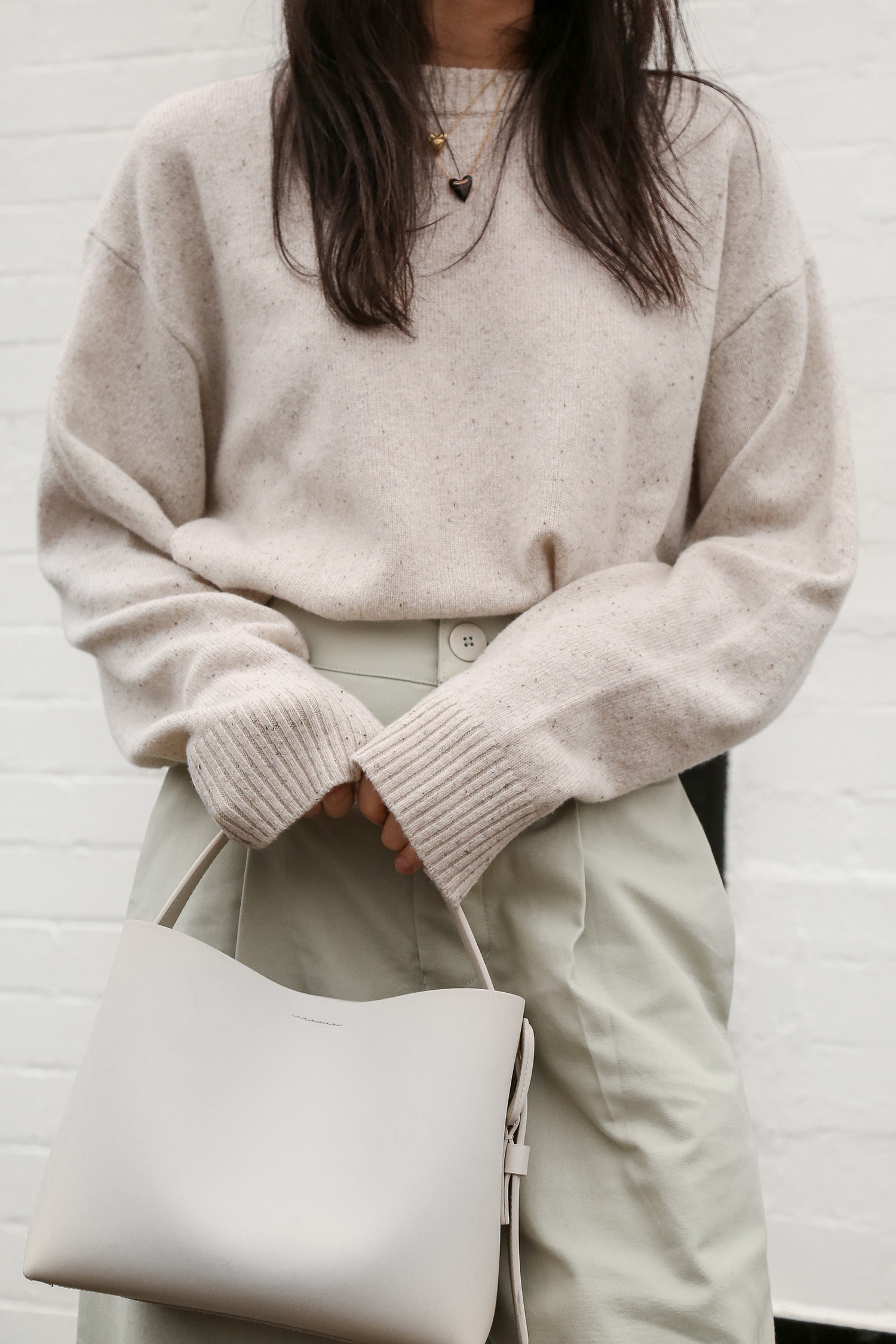 Arket rigid crossbody bag minimalist neutral style